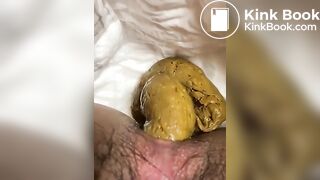 Hairy girl poops on the diaper