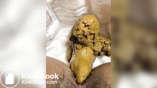 Hairy girl poops on the diaper