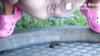 Shitting outside in a public Camping-Shower