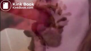 Dirty girl sucking and licking a shitty dildo