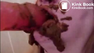 Dirty girl sucking and licking a shitty dildo