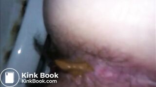 Hairy woman shitting closeup on a dirty toilet