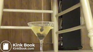 Busty babe shitting from wooden chair