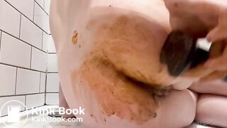 Redhead craps then plays with her dirty poopchute