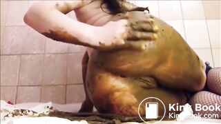 Brunette in fishnet smearing shit
