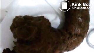 Round butt brunette shitting and eating shit