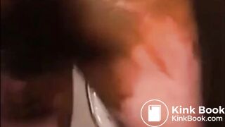 Woman shitting and smearing shit on her body