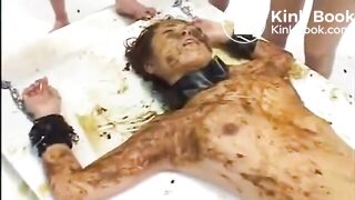 Asian whore eats shit with help from friends