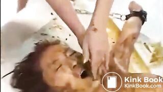 Asian whore eats shit with help from friends