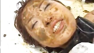 Asian whore eats shit with help from friends