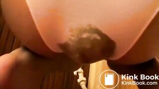 Poops In white panties tied standing