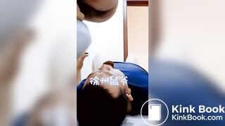 chinese escort feeding a pig