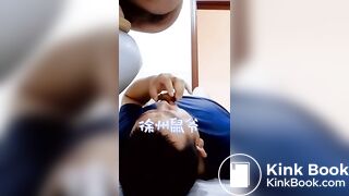chinese escort feeding a pig