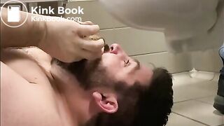 BEING FED IN A PUBLIC TOILET