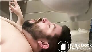 BEING FED IN A PUBLIC TOILET