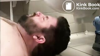 BEING FED IN A PUBLIC TOILET