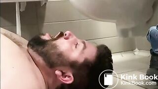 BEING FED IN A PUBLIC TOILET