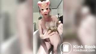 Pig masked swallow her own shit
