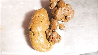 Logs exiting a perfect hole covered in cunt cream