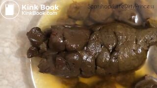 Big thick poop and bright yellow pee in a bowl