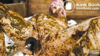 Catwoman Lyndra plays in cowshit