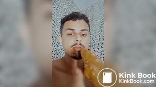 Brazilian twink dirtying his dildo with shit
