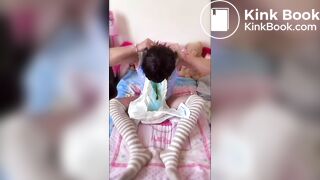 Face smearing of poop & hooded with a dirty nappy