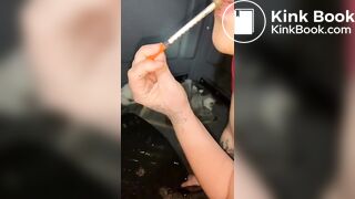 Syringe covered in shit for worthless human toilet