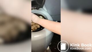 Syringe covered in shit for worthless human toilet