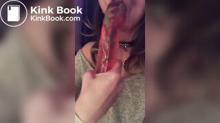 Pulls it out of her ass and sticks it in her