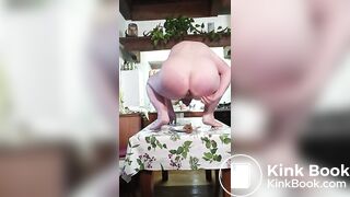 Pooping in the dish on kitchen table