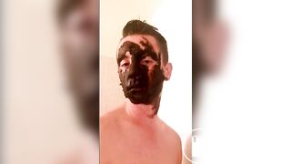 shitboy in the bath while the men watch sports