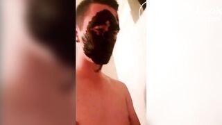 shitboy in the bath while the men watch sports