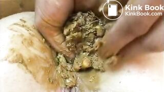Putting shit back in ass