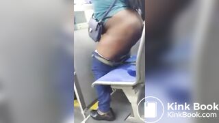 Filthy Fat Ass Black Slut pisses on bus seat