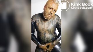 Posing around in rubber, covered in my own shit