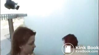 Lezzie shitty play on an outdoor balcony