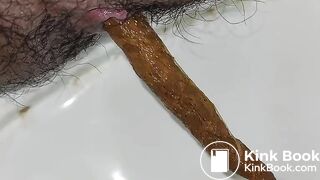 Close-up view of my anus while shitting