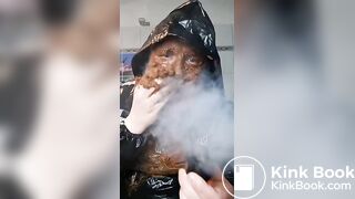 Smoking a pipe with a shit covered face