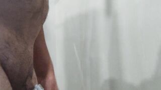 Pissing in a chastity cage