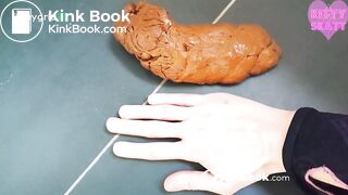 Kitty skatt massive log while squatting on toilet