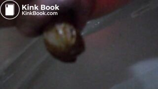 shitting a used rubber glove