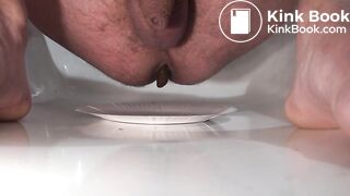 Shitting on a plate