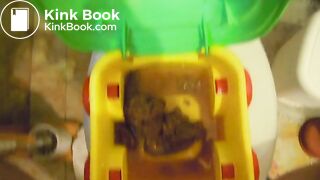 Piss into toy potty