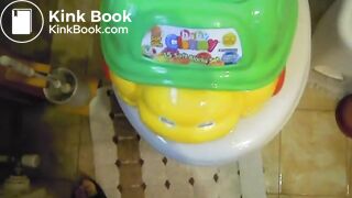 Piss into toy potty