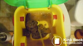 Piss into toy potty