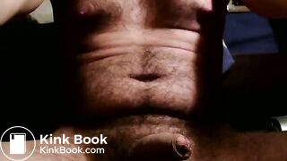 Beautiful masked guy covers his cock with warm feces