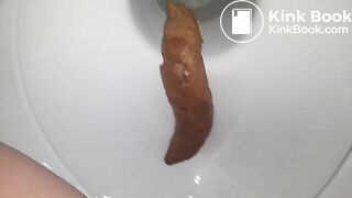 Dicke Wurst ins Klo gedrückt ;)