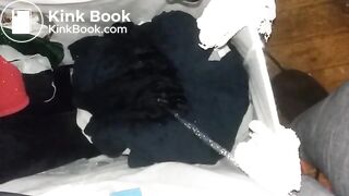 Pissing on dirty clothes