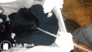 Pissing on dirty clothes